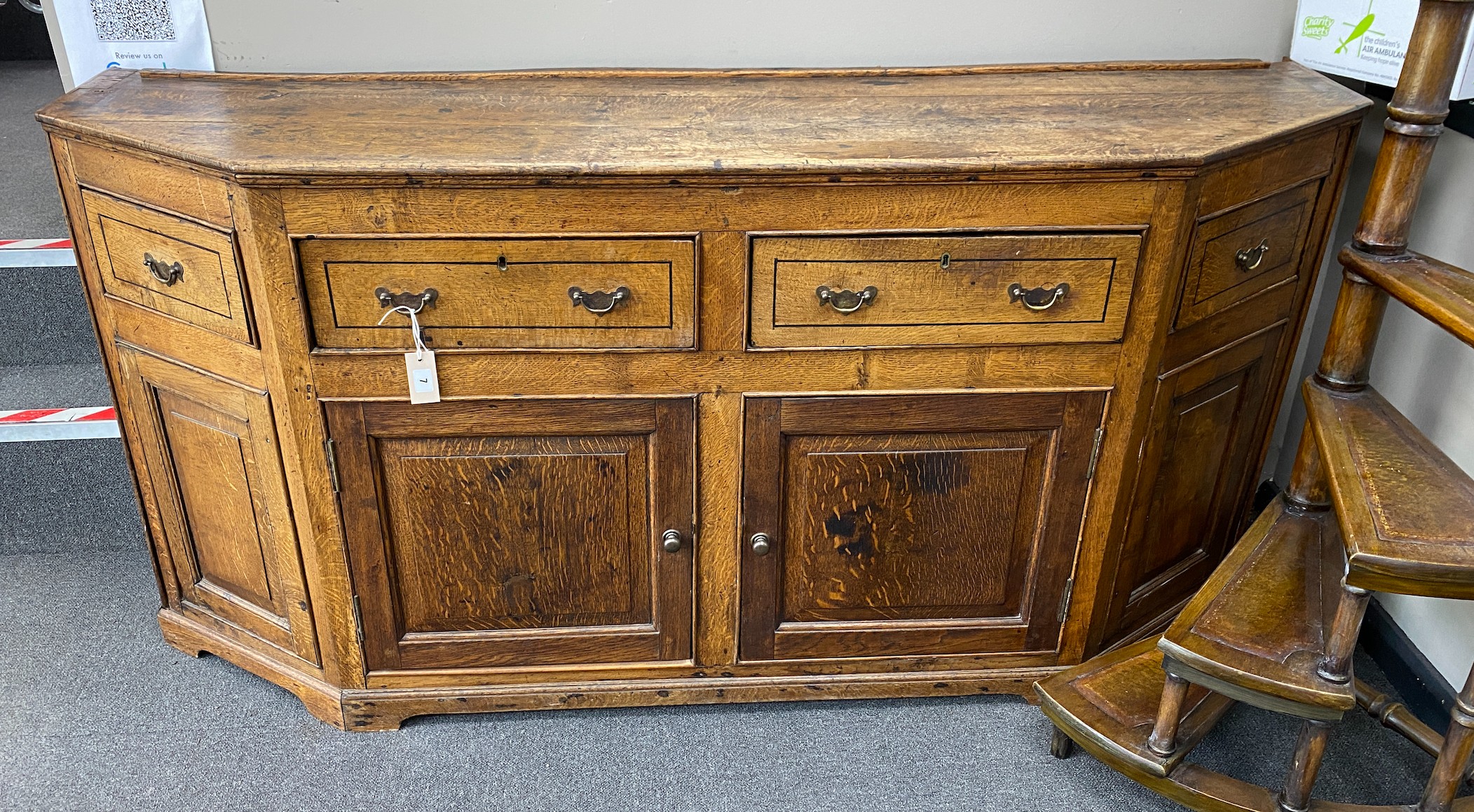 An 18th century oak low dresser, length 174cm, depth 48cm, height 87cm